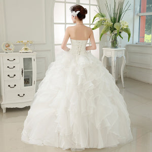 Pearl Sleeveless Wedding Dress with Ball Ruffled Skirt