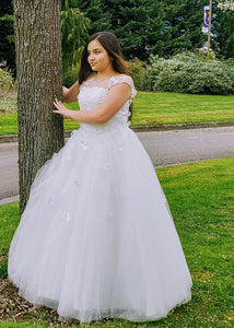 Sleeveless A-line Gown designed flowers over the dress